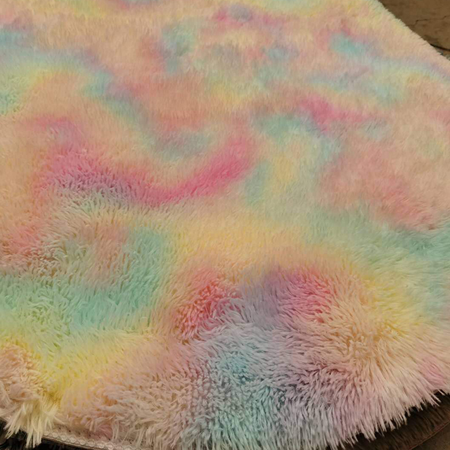 Fluffy rug placed perfectly in a modern bedroom setting